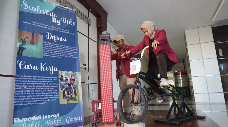 Gambar Berita Scalextric By Bike Buatan Mahasiswa KKN UM Surabaya, Solusi Terapi Fisik Berteknologi Anak Berkebutuhan Khusus (ABK)